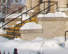 [photo of the library front steps with snow]